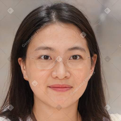 Joyful white adult female with long  brown hair and brown eyes