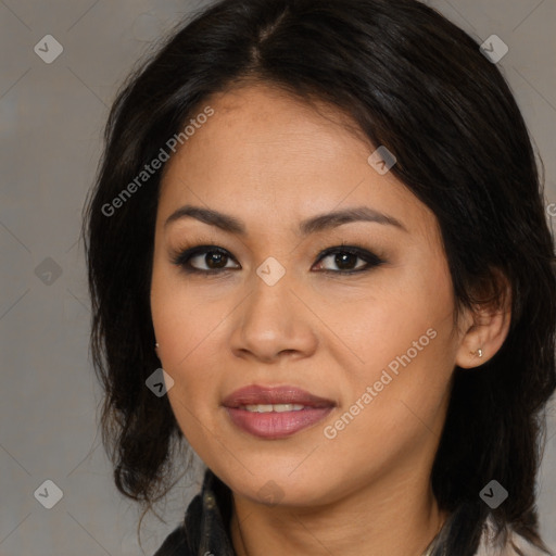 Joyful latino young-adult female with medium  brown hair and brown eyes