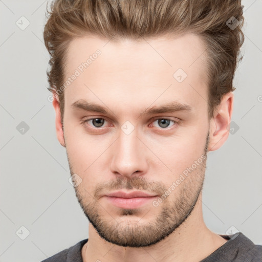 Neutral white young-adult male with short  brown hair and grey eyes