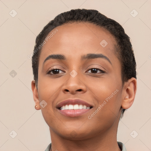 Joyful latino young-adult female with short  brown hair and brown eyes