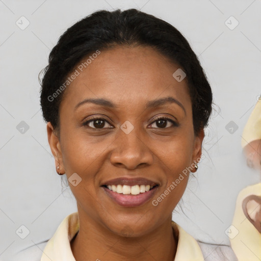 Joyful black adult female with medium  brown hair and brown eyes