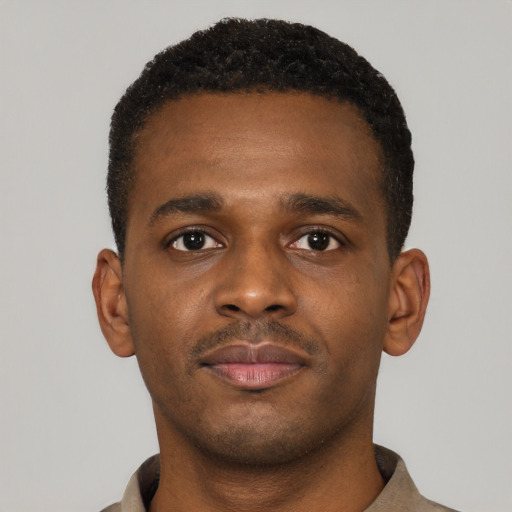 Neutral black young-adult male with short  brown hair and brown eyes