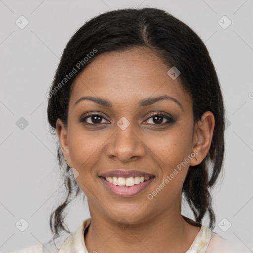 Joyful black young-adult female with medium  brown hair and brown eyes