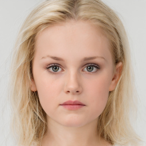 Neutral white young-adult female with long  brown hair and blue eyes