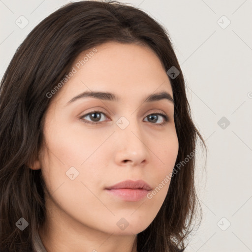 Neutral white young-adult female with long  brown hair and brown eyes