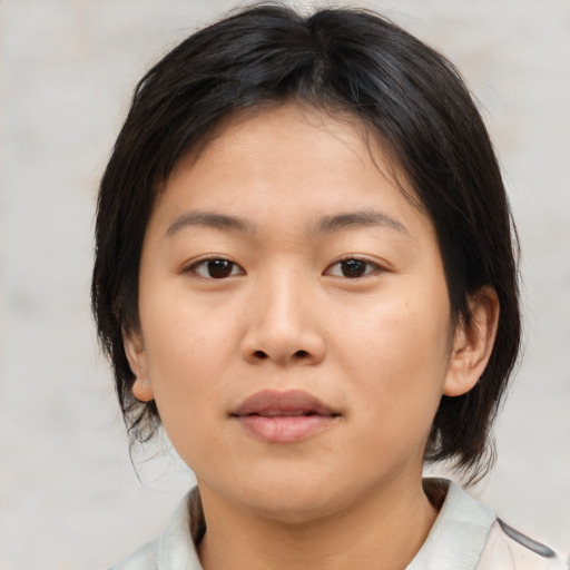 Neutral asian young-adult female with medium  brown hair and brown eyes