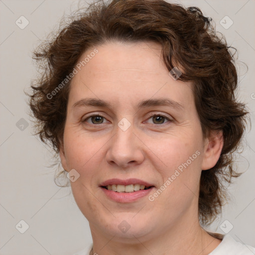 Joyful white young-adult female with medium  brown hair and green eyes