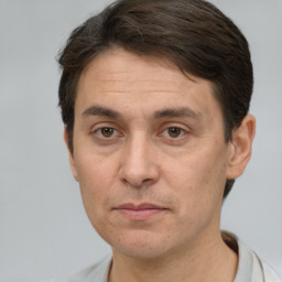 Neutral white adult male with short  brown hair and brown eyes