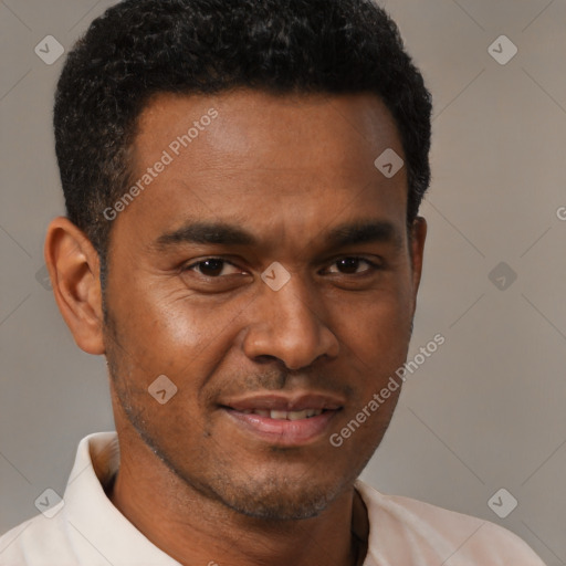 Joyful latino young-adult male with short  brown hair and brown eyes