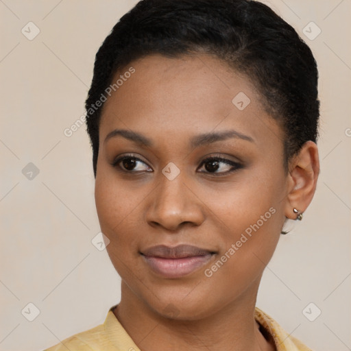 Joyful latino young-adult female with short  brown hair and brown eyes