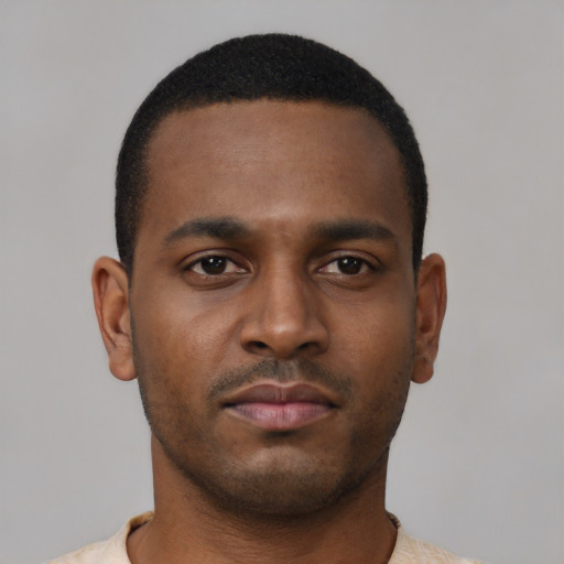 Neutral black young-adult male with short  black hair and brown eyes