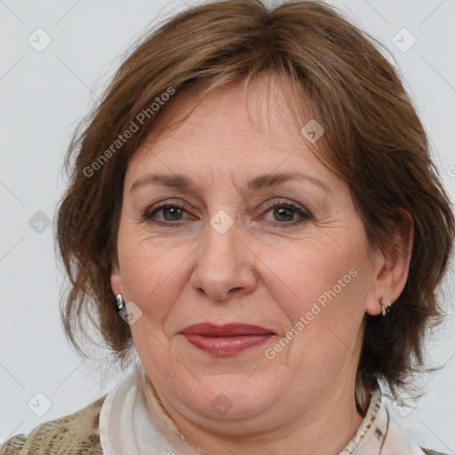 Joyful white adult female with medium  brown hair and brown eyes