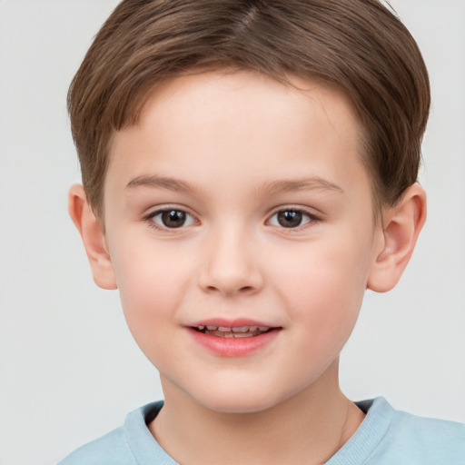 Joyful white child female with short  brown hair and brown eyes