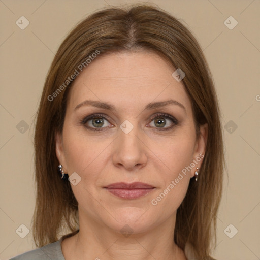 Joyful white adult female with long  brown hair and brown eyes