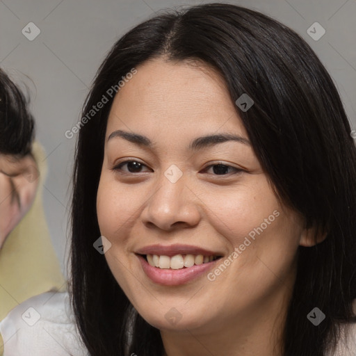 Joyful asian young-adult female with medium  black hair and brown eyes