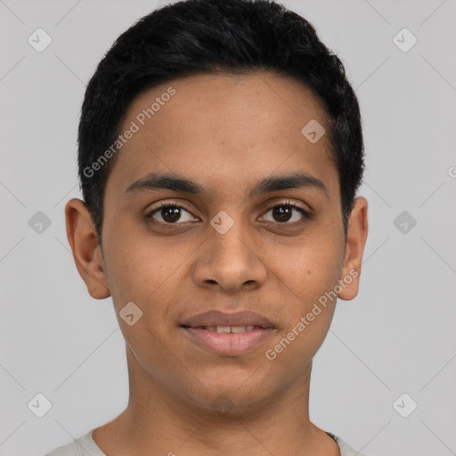 Joyful latino young-adult male with short  black hair and brown eyes