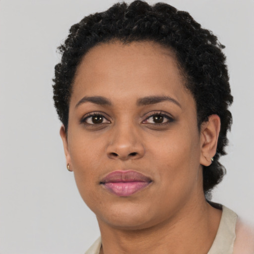 Neutral black young-adult female with short  black hair and brown eyes