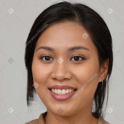 Joyful asian young-adult female with medium  brown hair and brown eyes