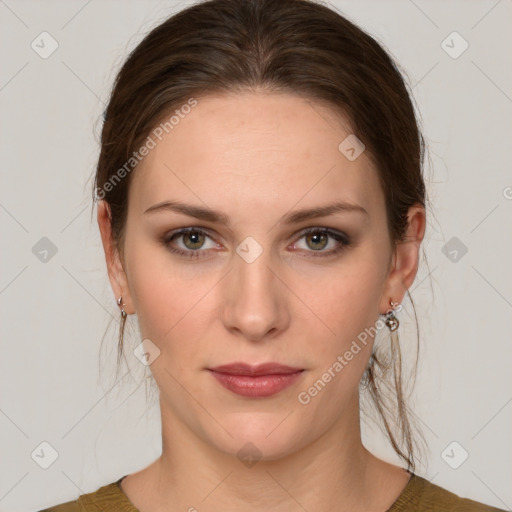 Joyful white young-adult female with medium  brown hair and green eyes