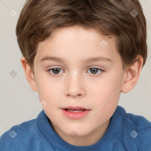 Joyful white child male with short  brown hair and brown eyes