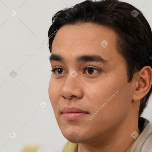 Neutral white young-adult male with short  black hair and brown eyes