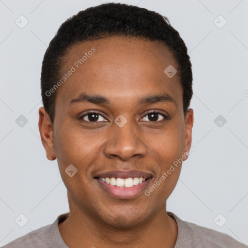 Joyful black young-adult male with short  black hair and brown eyes