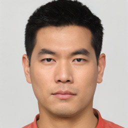 Neutral asian young-adult male with short  black hair and brown eyes