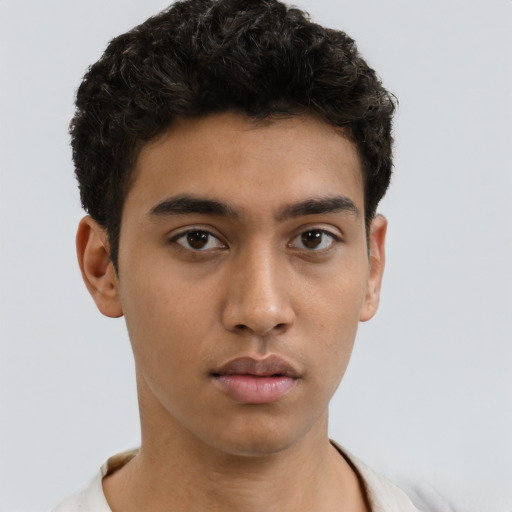 Neutral asian young-adult male with short  brown hair and brown eyes