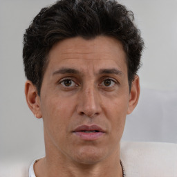 Neutral white adult male with short  brown hair and brown eyes