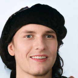 Joyful white young-adult male with medium  brown hair and brown eyes