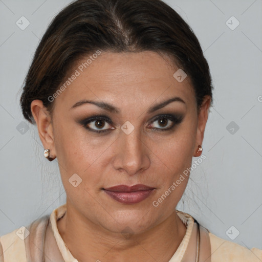 Joyful latino young-adult female with short  brown hair and brown eyes