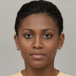 Neutral black young-adult female with short  brown hair and brown eyes