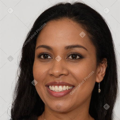 Joyful latino young-adult female with long  brown hair and brown eyes