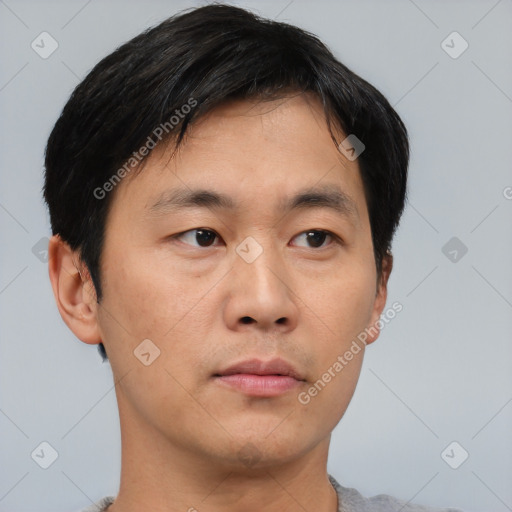 Neutral asian young-adult male with short  brown hair and brown eyes