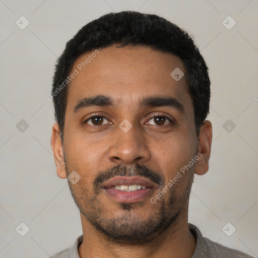 Neutral latino young-adult male with short  black hair and brown eyes