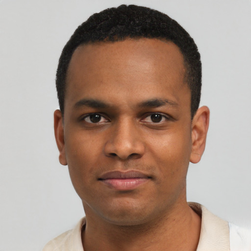 Neutral black young-adult male with short  black hair and brown eyes