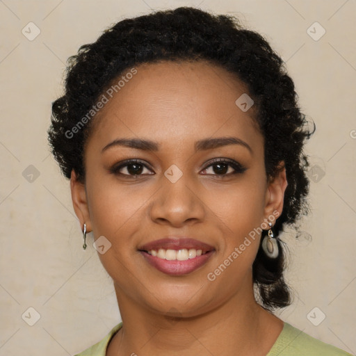 Joyful black young-adult female with medium  black hair and brown eyes