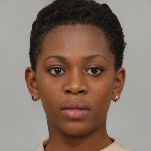Neutral black young-adult female with short  brown hair and brown eyes