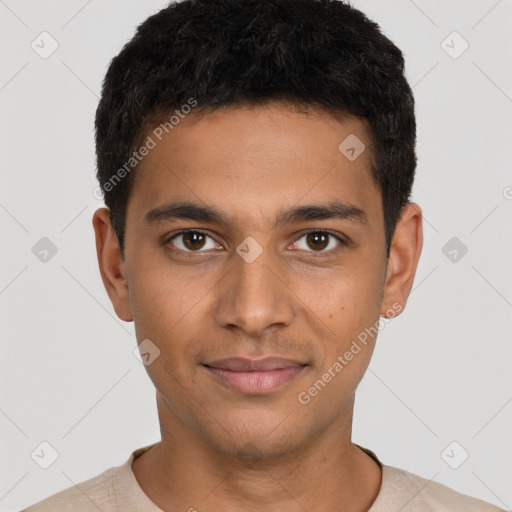 Joyful latino young-adult male with short  brown hair and brown eyes