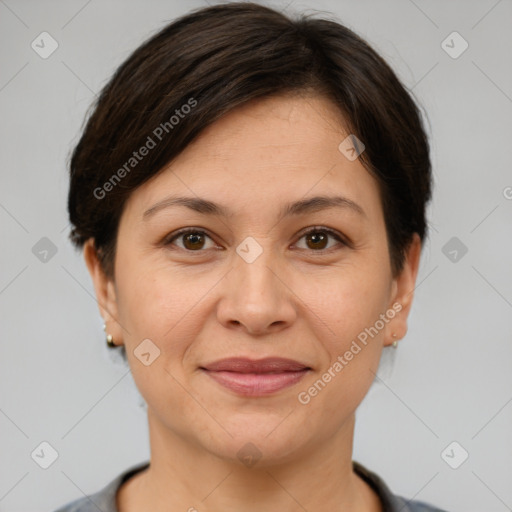 Joyful white adult female with short  brown hair and brown eyes