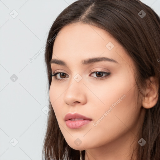 Neutral white young-adult female with long  brown hair and brown eyes