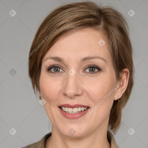 Joyful white young-adult female with medium  brown hair and grey eyes