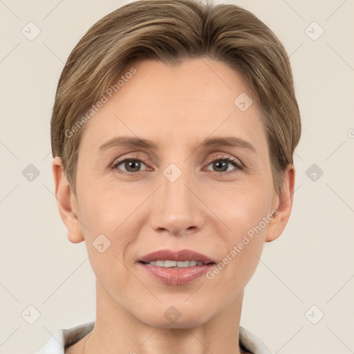 Joyful white adult female with short  brown hair and brown eyes