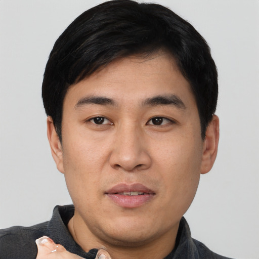 Neutral asian young-adult male with short  black hair and brown eyes
