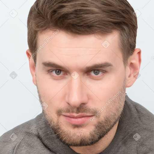 Neutral white young-adult male with short  brown hair and grey eyes