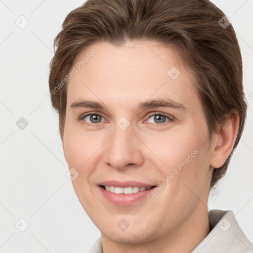 Joyful white young-adult female with short  brown hair and grey eyes