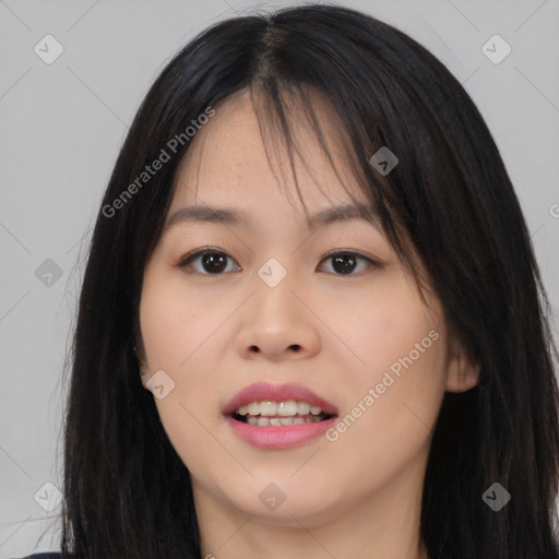 Joyful asian young-adult female with long  brown hair and brown eyes