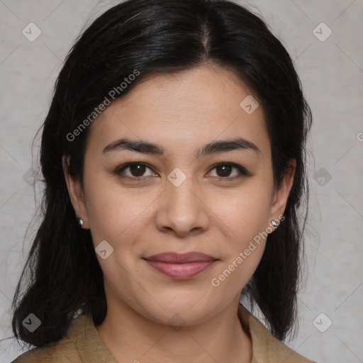 Joyful latino young-adult female with medium  brown hair and brown eyes