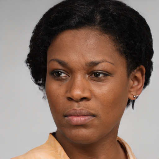 Neutral latino young-adult female with short  black hair and brown eyes