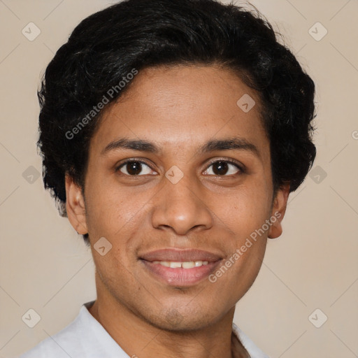 Joyful latino young-adult male with short  brown hair and brown eyes